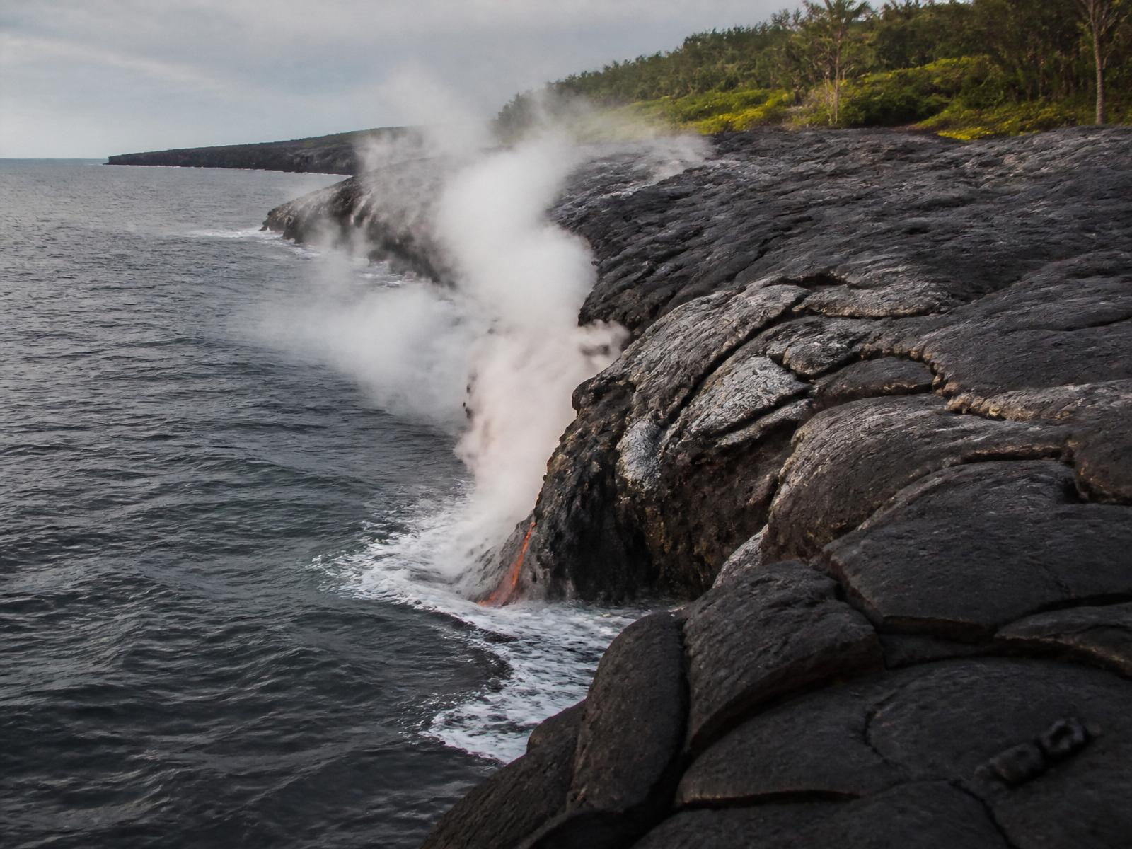 Big Island lava meeting the Pacific — active volcanic coastline